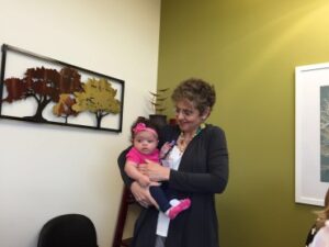 Dr. Nanette Santoro holds Beth Hunter's daughter, born through IVF after surgery for uterine fibroids | CU OB-GYN | Denver, CO