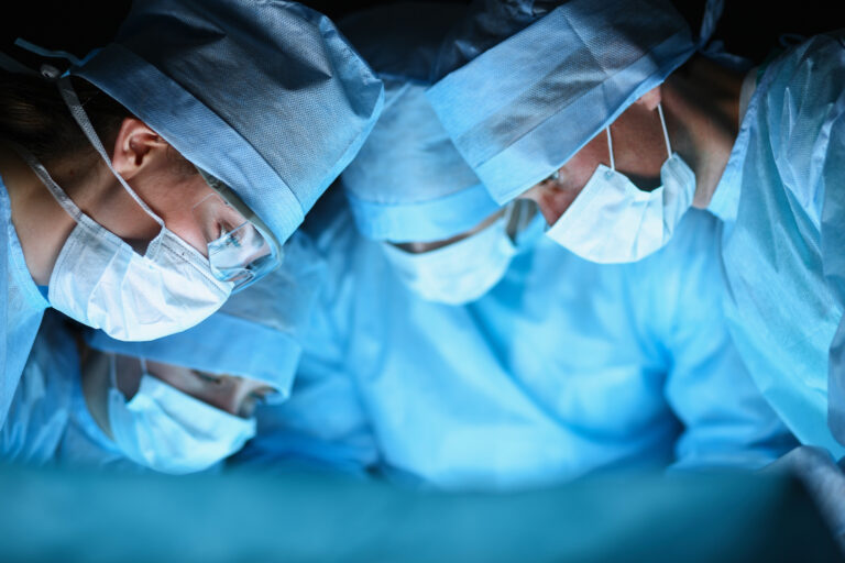 surgical team performs partial hysterectomy University