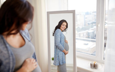 Pregnancy Physiology | CU OB-GYN | Photo of pregnant woman in mirror