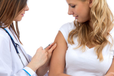 HPV vaccinations | CU OBGYN | Photo of woman receiving vaccination