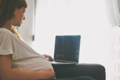 pregnancy | CU OB-GYN | pregnant woman browsing internet